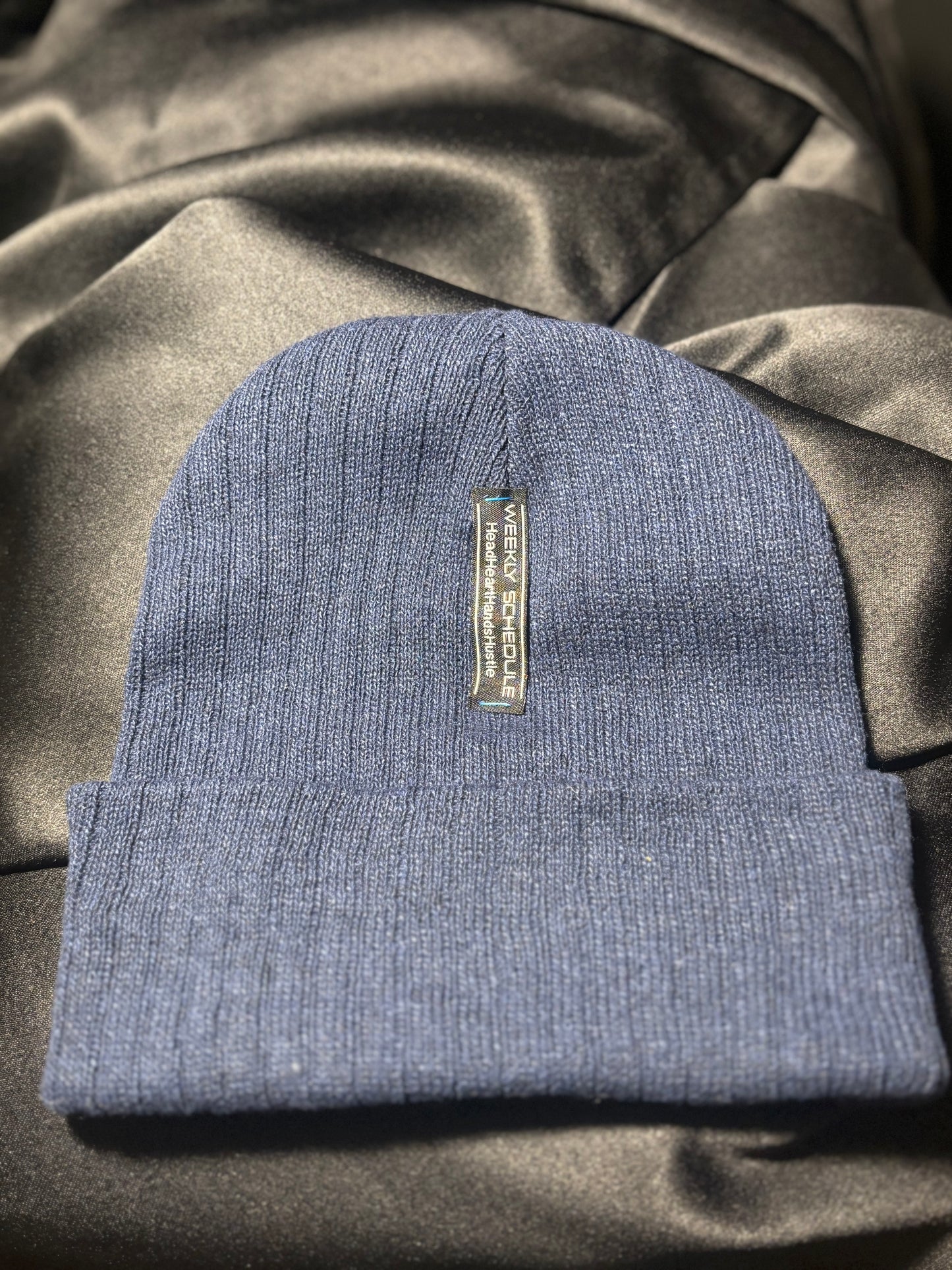 WEEKLY SCHEDULE Logo Beanie - Blue w/Light Blue & Gold Logo